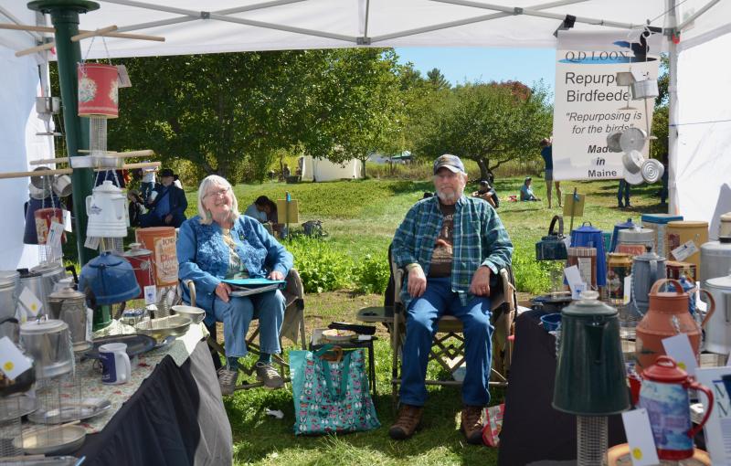 Queen and Dave Wacker, of Pittson, bring their repurposed bird feeders to the fair. They visit yard sales and the Goodwill stores to find suitable old coffee pots and tea kettles and refashion them into bird feeders. (Photo by Lynda Clancy) Queen and Dave Wacker, of Pittson, bring their repurposed bird feeders to the fair. They visit yard sales and the Goodwill stores to find suitable old coffee pots and tea kettles and refashion them into bird feeders. (Photo by Lynda Clancy)