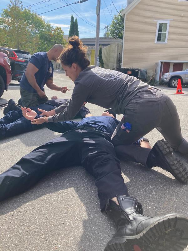 Practicing the MARCH assessment. MARCH is a trauma assessment mnemonic that references massive hemorrhage, airway control, respiratory support, circulation, hypothermia and head injury. (Photo courtesy Matt Heath/Camden Fire Dept.) Practicing the MARCH physical assessment: massive hemorrhage, airway control, respiratory support, circulation, hypothermia and head injury. (Photo courtesy Matt Heath/Camden Fire Dept.)