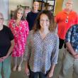 Pen Bay and Waldo Community Health Workers: Front row, from left: Fran Butler; Breanne Bucka; and Quinn Pickett. Middle row, from left: Melissa Crowley and Richard “Dick” Morin. Back row: Adi Govinda Dasa. (Photo courtesy MaineHealth)