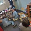 A group of volunteers rearranges the children's area of the Thomaston Public Library during 2023's Together for Thomaston Event. (Photo by Kendray Rodriguez)