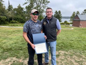 DMR Employee of the Year, Timothy Bennett, left, with Commissioner Patrick Keliher. Courtesy of DMR