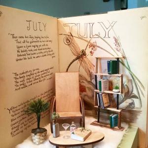 A Cozy Book Nook featuring a 1906 illustrated diary as the backdrop. (Photo courtesy Tonic of the Woods) A Cozy Book Nook featuring a 1906 illustrated diary as the backdrop. (Photo courtesy Tonic of the Woods)