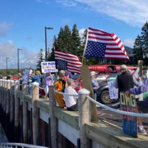 Demonstrators line the Port Clyde Public Landing to protest rulings by U.S. Supreme Court Chief Justice Roberts. (Photo courtesy Nancy Button) Demonstrators line the Port Clyde Public Landing. (Photo courtesy Nancy Button)