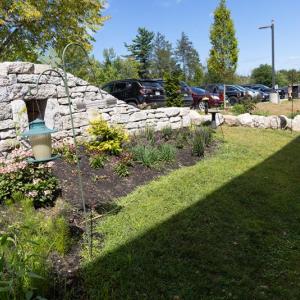A view of MaineHealth Waldo Hospital's healing garden, which can be seen from the hospital’s cancer care and IV therapy unit. (Photo courtesy MaineHealth Waldo Hospital) Gardens against stone walls
