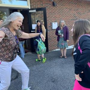 Susan Johns’ photo of Wiscasset Elementary School fourth grade teacher Becky Hallowell greeting incoming fifth grader Patience Davis on the first day of school Sept. 3, 2024 took first place for People Photo, Weekly 2 division of the 2025 Maine Press Association Better Newspaper Contest. File photo SUSAN JOHNS/Wiscasset Newspaper